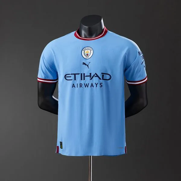 Camiseta de fútbol Manchester City 2022/23 LOCAL MANGA CORTA VERSION JUGADOR